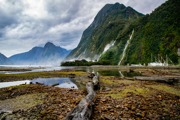 Waterfall and Mitre peak views on an overcast day at Milford Sound