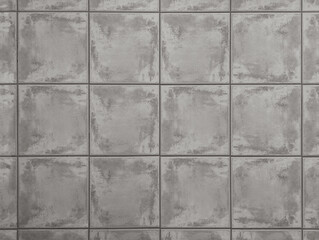 Top view of rustic grey porcelain ceramic tiles for interior or exterior floor, wall, porch. Textured gray square slabs texture background. Mediterranean style decor.