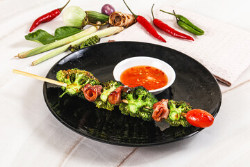 Thai Street foof satay with bacon and broccoli