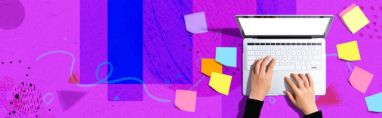 Laptop computer with many sticky notes - Flat lay