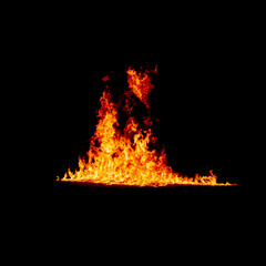 Flame burns in dark, isolated fire