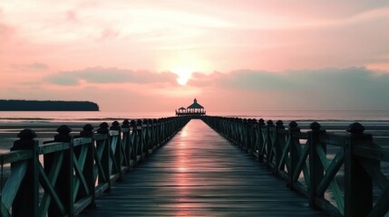Obraz premium Tranquil Sunset Over Water with Pier and Pavilion in Soft Pastel Colors
