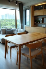 A wooden dining table with four chairs and a couch in the background
