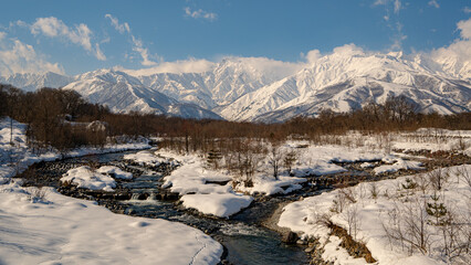 清流と雪の北アルプス　長野県白馬村
