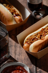Crispy onion hot dogs with ketchup and soda. Fast food.