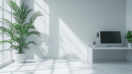 Minimalist bright home office with sunlight, plants, and computer.