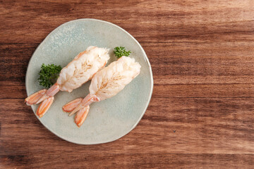 Burn Shrimp Sushi Served on a Plate.