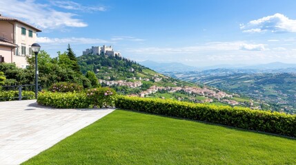 Obraz premium Hilltop Castle and Village Landscape