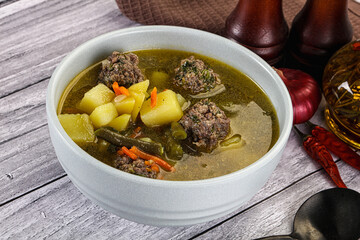 Soup with beef meatballs and vegetables