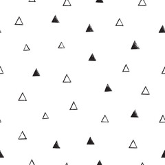 Linocat seamless pattern with triangless. Black and white block print.  Vector illustration in vintage technique.