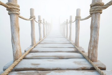 Naklejka premium A bridge with a rope railing and a foggy sky in the background