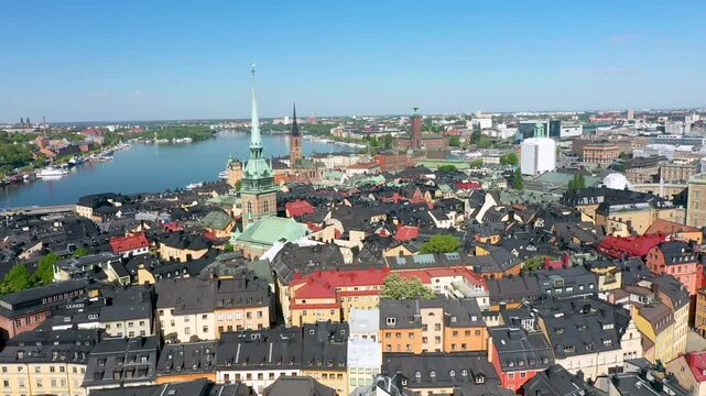 Stockholm gamla stan panoramic view showing colorful buildings and riddarholmen church