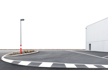 Empty parking lot with modern building