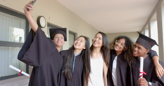 Diverse group of graduates celebrate their achievement