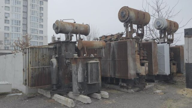 Transformers at a Ukrainian power substation, cut by shrapnel from shells and drones