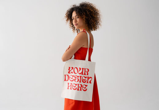 Mockup Of Woman With Customized Tote Bag