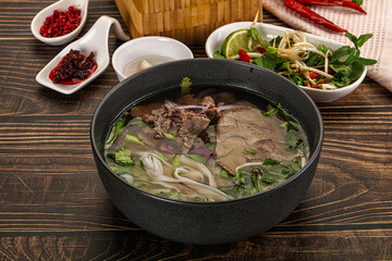 Vietnamese Pho Bo soup with beef and noodles