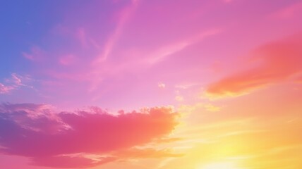 Obraz premium A vibrant sky filled with hues of pink, orange, and blue, showcasing a stunning sunset or sunrise.