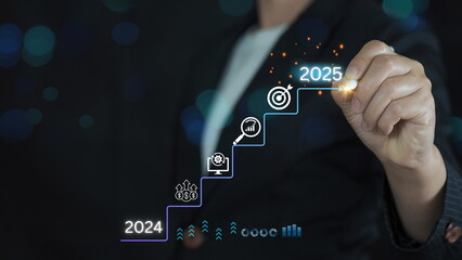 Planning and challenge, investors target. 2025 New Year Business Goals Concept. Businessmen point...