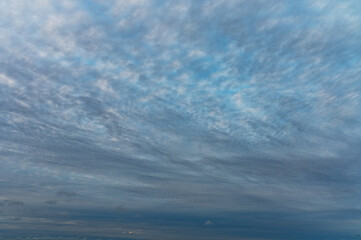 Fototapeta premium Blue Sky with Fluffy White Clouds on a Sunny Summer Day