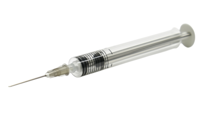 A close-up view of a medical syringe lying on a sterile surface, ready for vaccination purposes