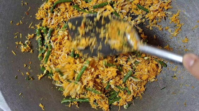 the process of making a delicious traditional Indonesian dish called urap sayur