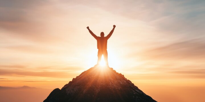 Contemporary Motivation Silhouette Climber Ascending Rocky Peak at Sunset - Inspirational Content for Leadership Development and Goal-Oriented Business Workshops