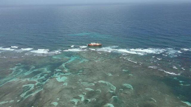 Guna Yala San Blas islands Caribbean Sea Panama fishing boat sailing over water, aerial