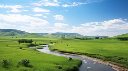 Naklejka premium Tranquil River Meandering Through Lush Green Valley Landscape