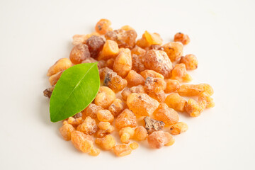 Frankincense or olibanum aromatic resin isolated on white background used in incense and perfumes.