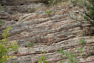 Gray brown  pink mountain background made from layers of dolomite rock in Budva, Montenegro. High quality photo