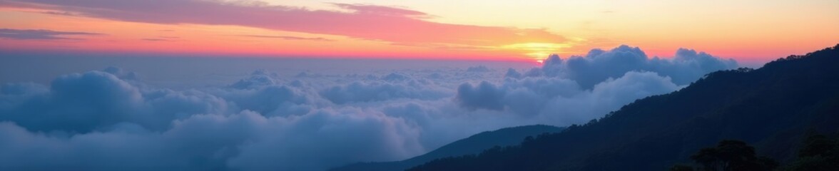 Obraz premium Clouds rolling over the Darjeeling ranges at dawn, landscape, darjeeling, sky