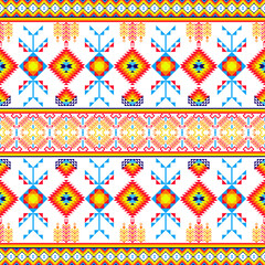 a vibrant geometric pattern inspired by traditional tribal or indigenous textile designs. It features symmetrical shapes, diamond motifs, and a colorful palette. Vector ethnic Navajo seamless pattern