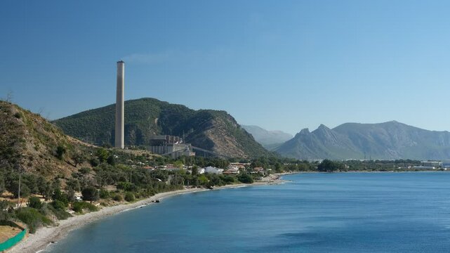 Turkevleri beach. Thermal power plant on the shores of the sea. Aegean Sea. Mugla city, Turkey 