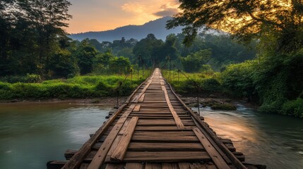 Fototapeta premium Wooded bridge over the river in Sangkhlaburi District, Kanchanaburi, Thailand. And is a major tourist attraction of Thailand