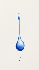 A Single Blue Water Droplet Falling Downwards