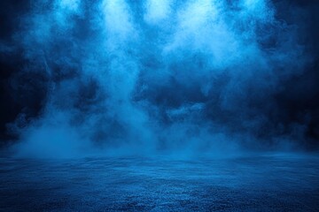 Blue smoke effect on dark stage floor with dramatic lighting and moody atmosphere