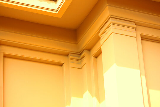 light and shadow on an old building the coner design create different level of surace tocreate dimension