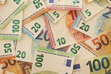 Pile of euro paper banknotes as finance background
