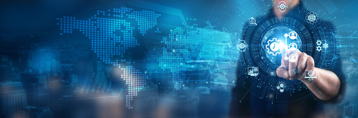 Businessman touching Enterprise Resource Planning (ERP) interface system technology, automated financial management, supply chain optimization, cross-departmental collaboration.