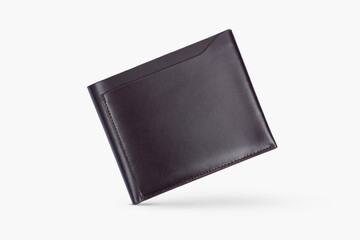 Genuine leather fashionable black wallet for men's isolated on a white background. A professional and stylish look. top view of black leather wallet. banknotes and put card inside the wallet