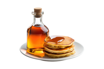 Stack of pancakes drizzled with maple syrup served with a bottle in a white plate isolated on white or transparent, PNG