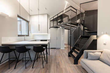 Modern Luxury Home Loft Apartment Kitchen And Living Room Interior with Stylish Mezzanine and Minimalist Design