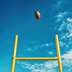 High Shot of a Rugby Ball Near Goalposts Against Blue Sky