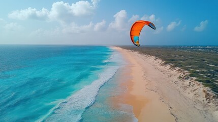 Obraz premium Kite Surfing Paradise: Aerial View of a Stunning Beach and Turquoise Ocean