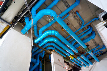 water system. Large blue pipe PVC in the construction of high-rise buildings.