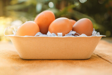 Store eggs in recycled cardboard boxes.