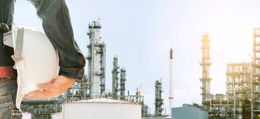 engineer working in Oil refinery plant from industry, large Oil and gas petrochemical industrial,...