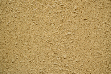 texture of putty painted orange gently orange painted wall pastel.