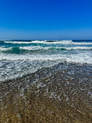 Beautiful seascape of the Mediterranean Sea with waves crashing on the shore